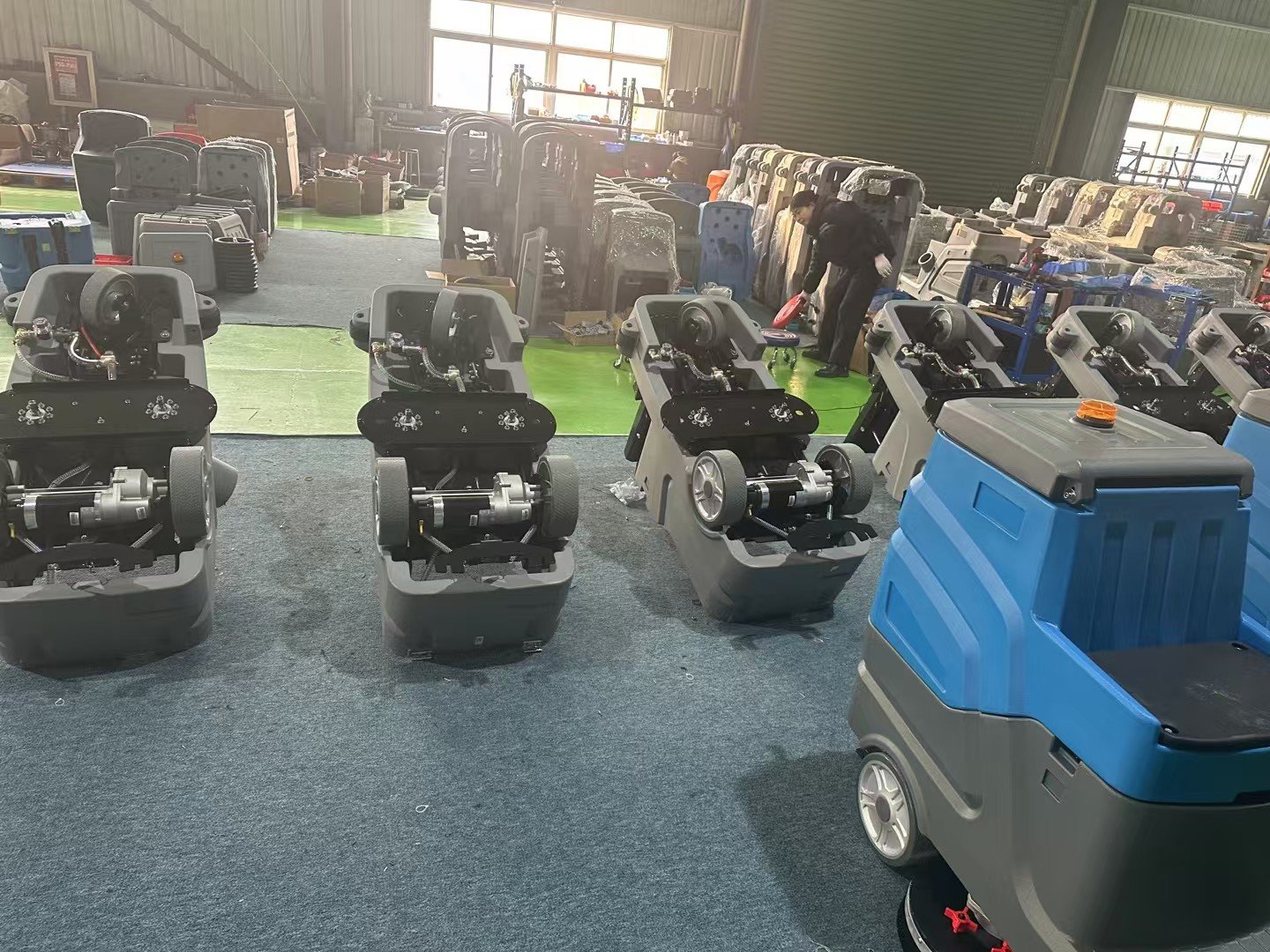 Floor scrubber chassis being assembled